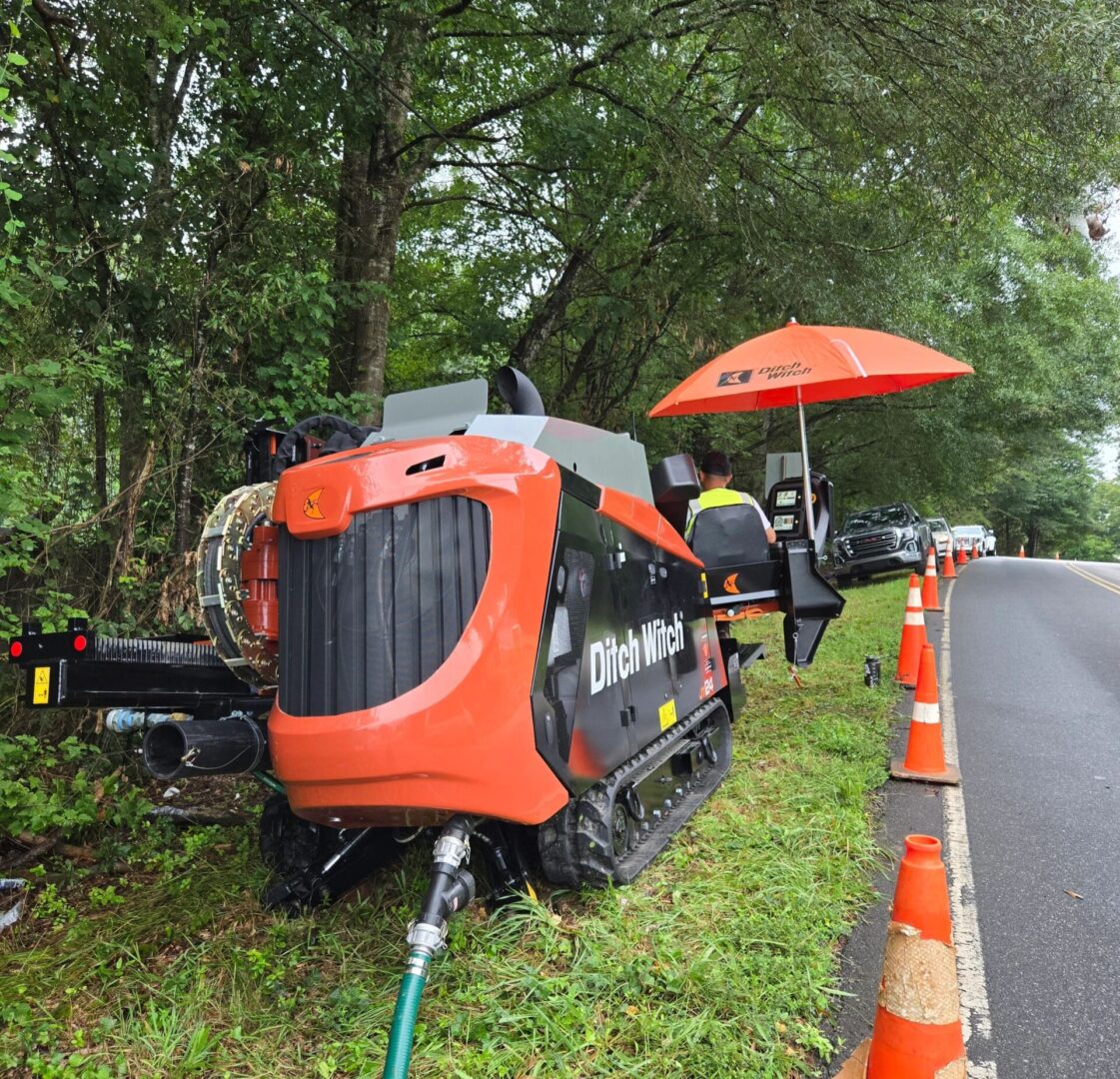 Roadside construction with orange machinery